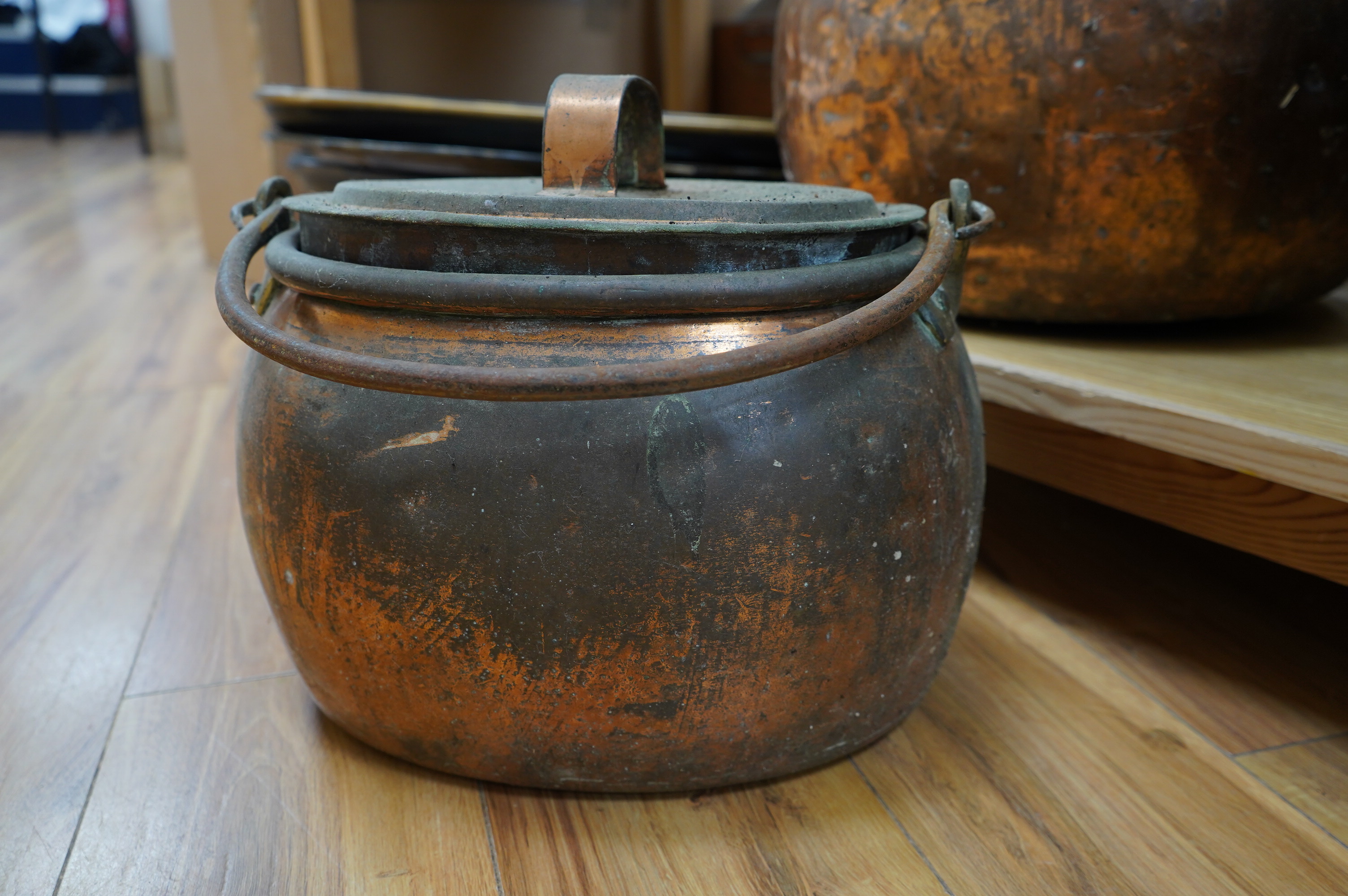 Two copper cauldrons and covers and a copper log bin (3). Condition - poor